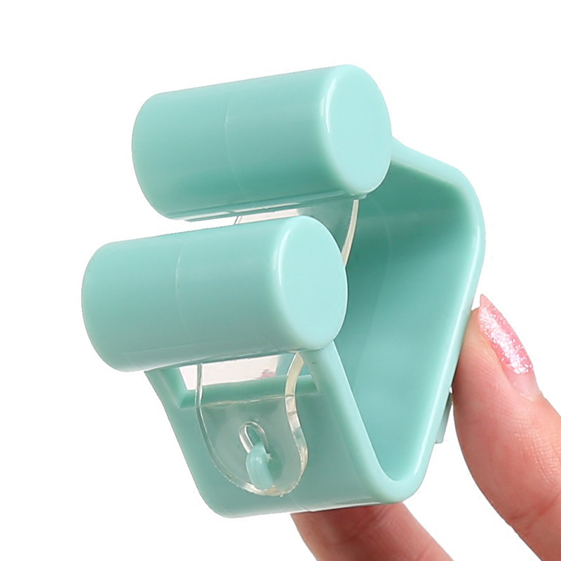 1 pz punzonatura gratuita Mocio gancio di alta qualità senza soluzione di continuità antiscivolo cremagliera di stoccaggio appeso a parete gancio di stoccaggio cremagliera porta scopa Mocio clip