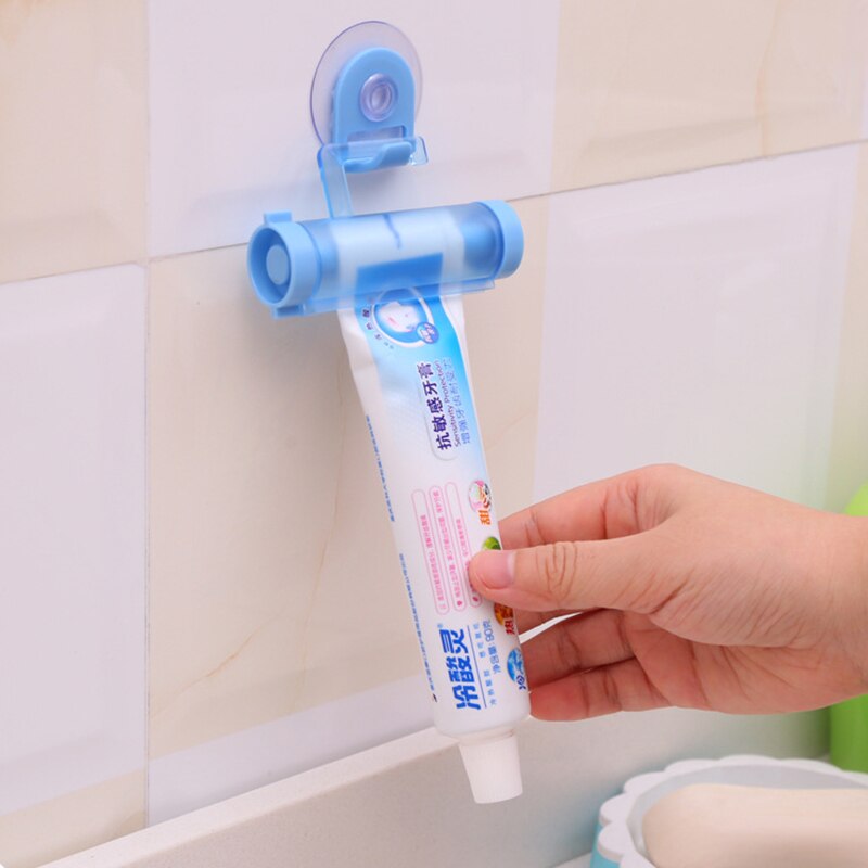 Plast rullende tandpasta presser tandpasta dispenser holder væg sugekop tandpasta rør presser tandpasta rulle