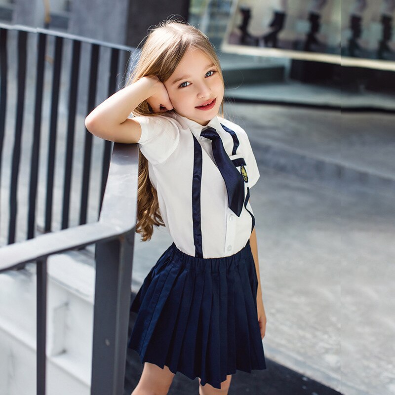 Uniformes escolares japoneses coreanos de algodón para niños y niñas, camiseta blanca, Falda plisada azul marino, pantalones cortos, conjuntos de trajes para estudiantes
