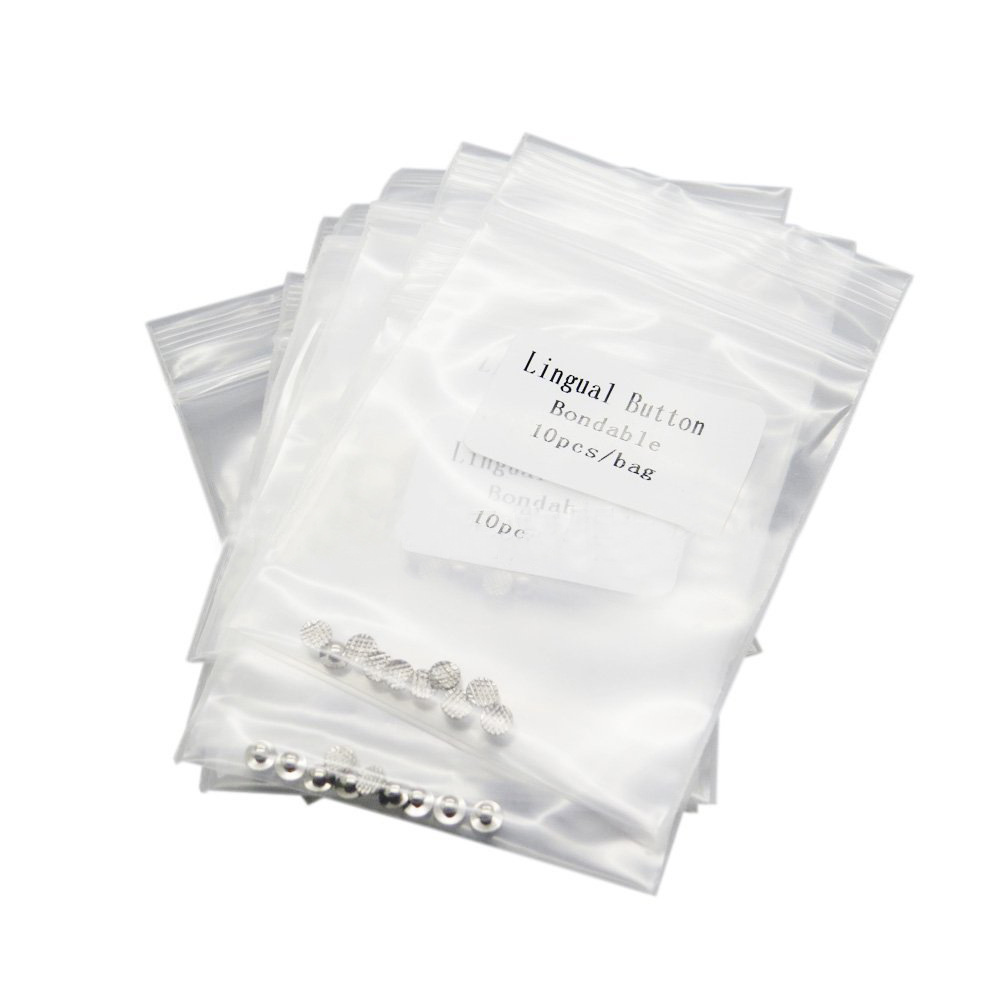 Bouton binoculaire orthodontique dentaire, monobloc MIM, maille ronde, fond métallique collable, 10 pièces/paquet, boucle latérale de langue
