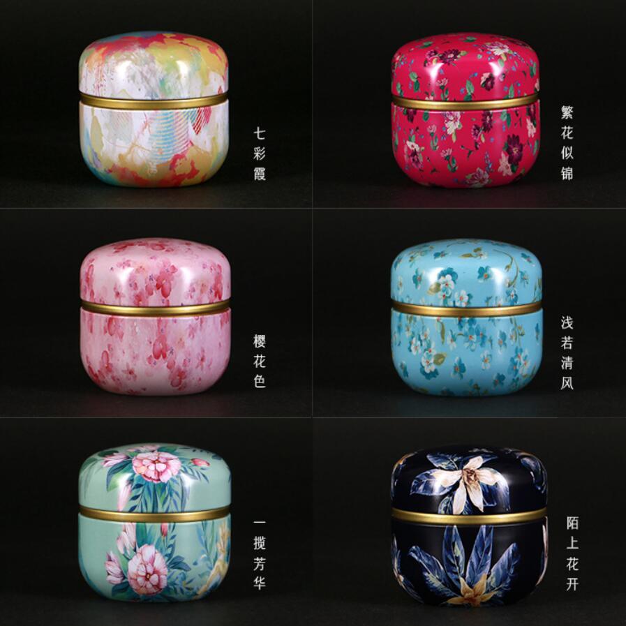 Lata de té de metal de alta gama, creativa, japonesa, pequeña, redonda, portátil, para viaje, caja de embalaje, caja de hierro