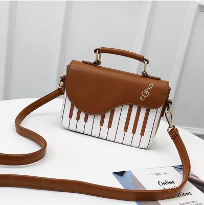 Enjoini søt piano mønster pu skinn uformell damevesker og veske skulderveske crossbody messenger bag veske: Brun