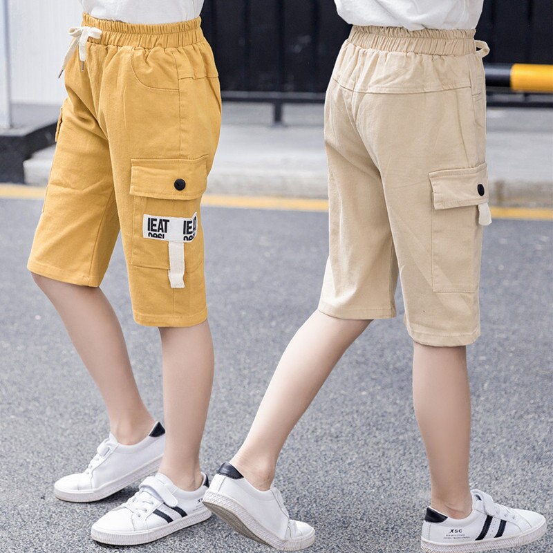 Sommar barns fritidsshorts pojkar flickor enfärgad resår i midjan korta byxor unisex barn strandshorts för 5-13 år