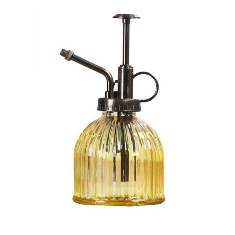 Retro glazen spuitfles, planten, bloemen, waterkan, tuinsproeier, pomp, mist, gieter, pot: Gele platte bodem