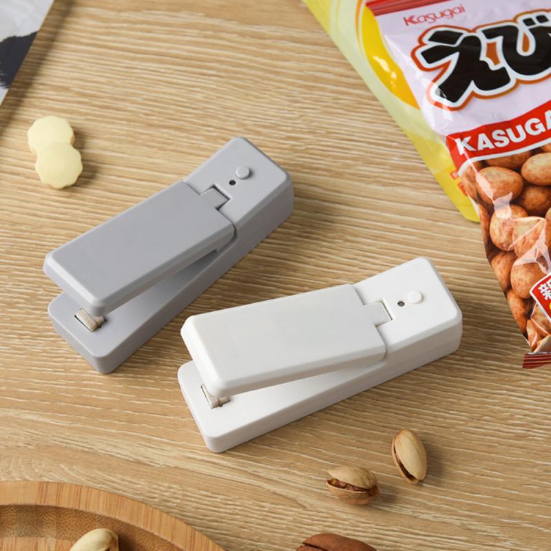 Mini máquina selladora portátil de doble uso, máquina de sellado térmico con carga USB, sellador de presión de la mano para el hogar y la cocina