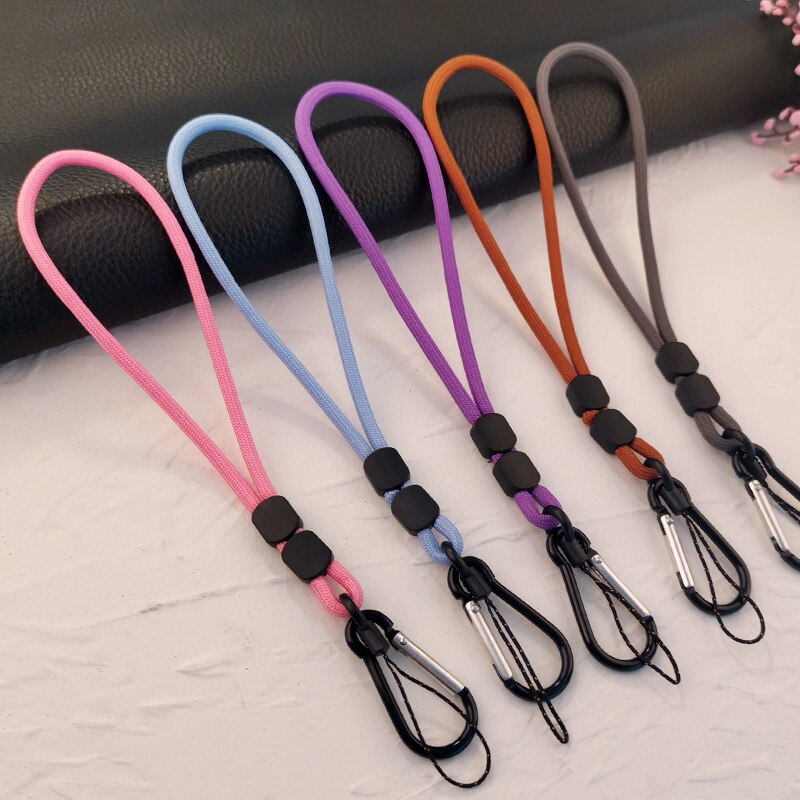 Cordón ajustable para teléfono móvil, cuerda corta tejida a mano, colgante para muñeca, funda universal antipérdida que combina con todo