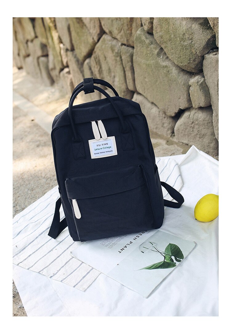 Mochila impermeable de lona para mujer, morral escolar para adolescentes y niñas,: Black