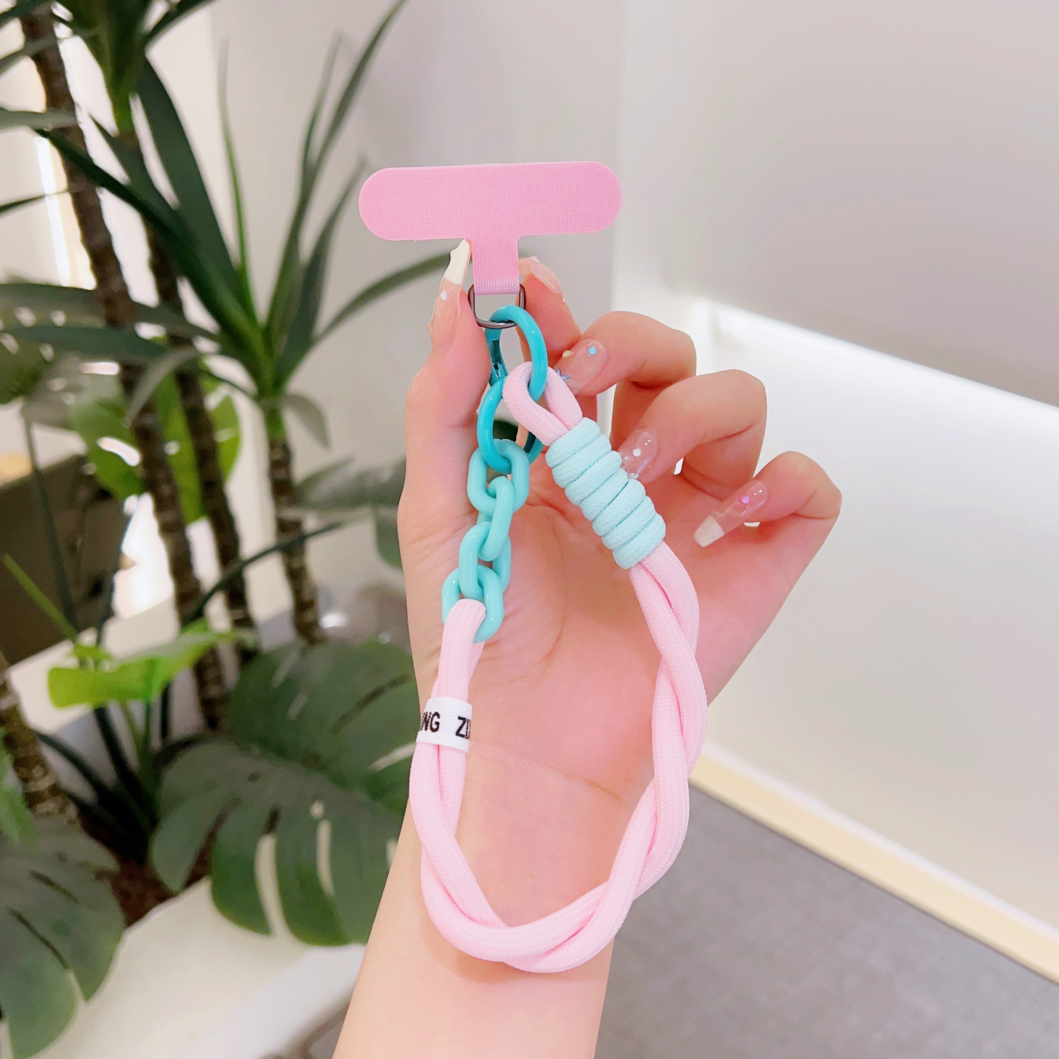 Vävd mobiltelefon universal snodd handledsrem handdrag kort rep mobiltelefon dekorativa hängsmycken tillbehör: Rosa