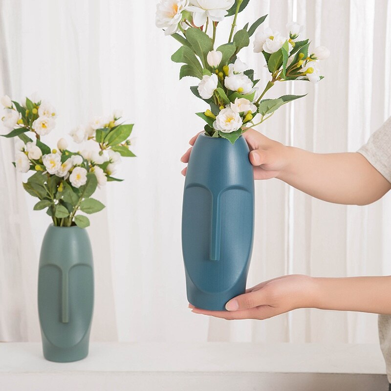 Nordisk minimalistisk pe abstrakt vase menneskeligt ansigt display værelse dekorativ figue hoved form vase