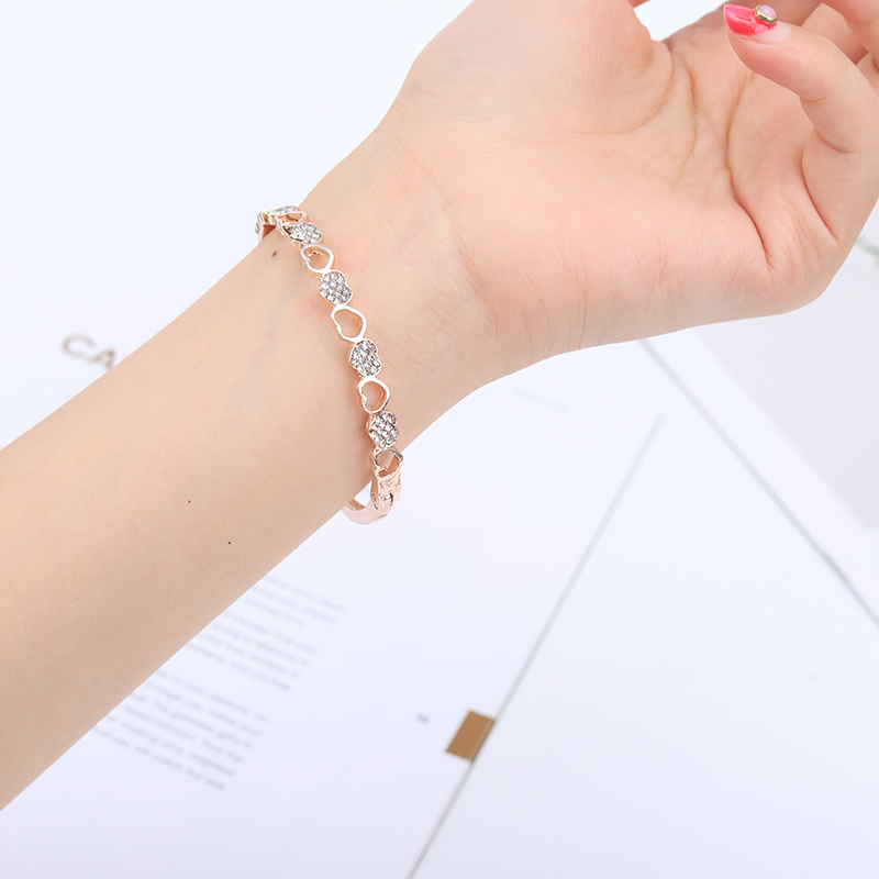 Trendy dame / pigesrose guldfarve klare østrigske krystal twist armbånd & armbånd smykker: F2719