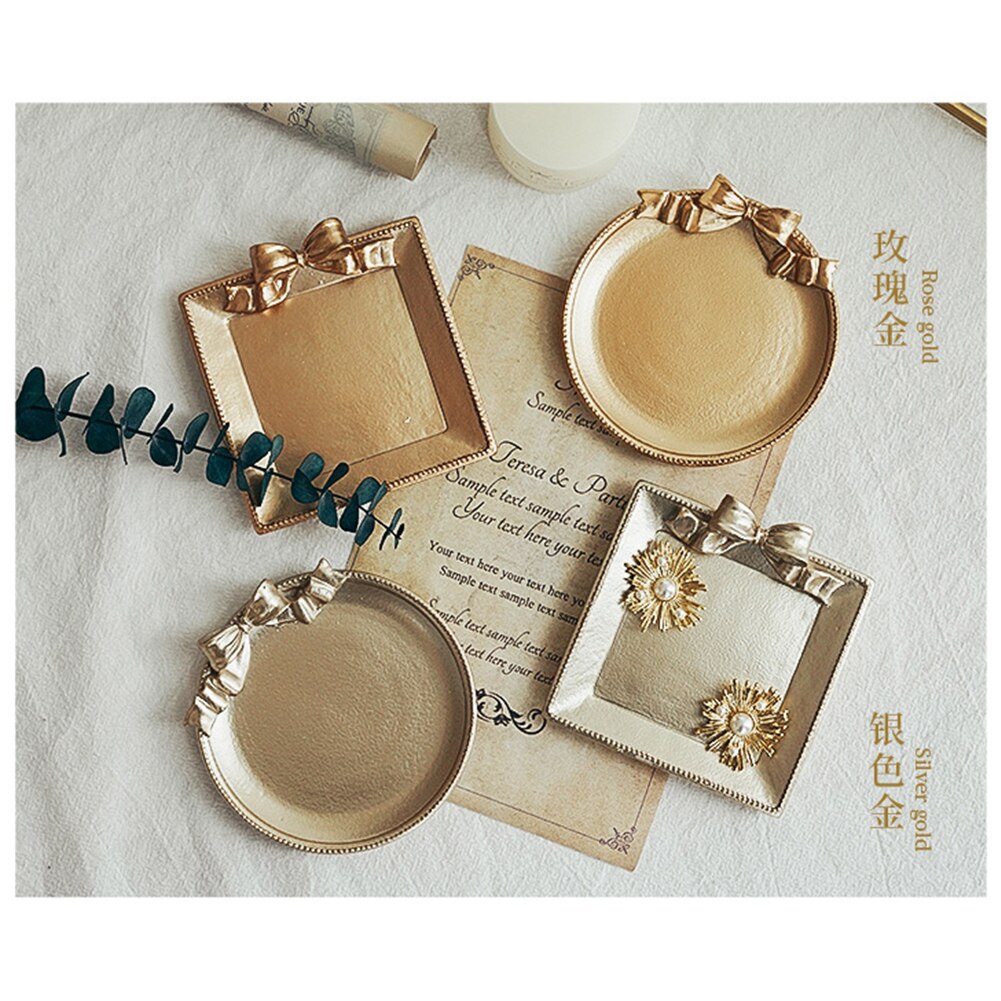 Retro still life photography, photo studio prop, golden vintage plate, dish with bow knot for jewelry, earrings, photography