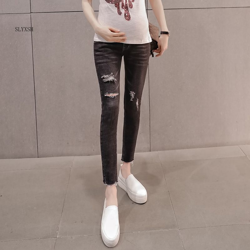 Tejanos nueve pantalones para mujeres embarazadas, modelos de otoño , ropa elástica con agujeros, ropa de maternidad informal