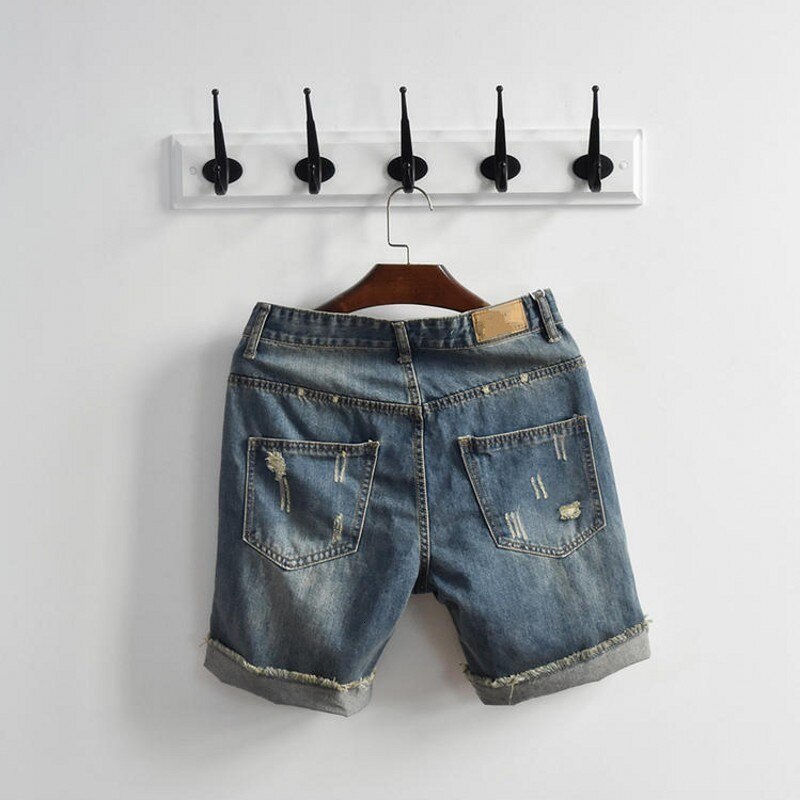 Verano agujero rasgado Big Boy Denim Shorts clásico rodilla lavada Streetwear ropa de playa cremallera Fly pantalones para hombre
