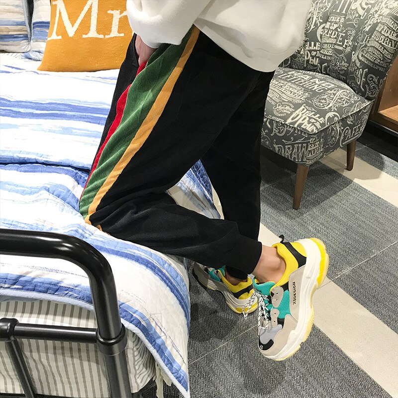 Rua hip-hop calças simples vestido estilo ginásio jogging temperamento calças soltas calças de fitness masculina roupas masculinas musculação