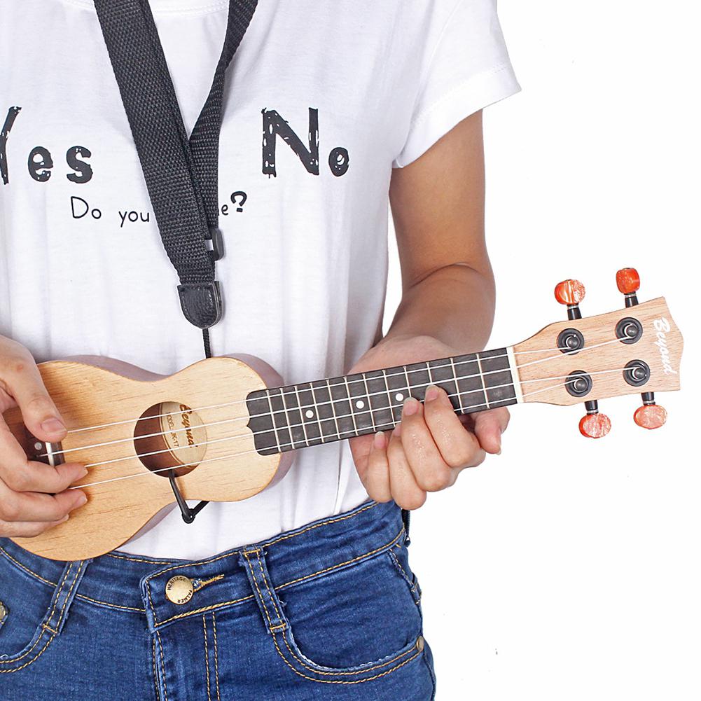 Mini guitare de poche en bois de séquoia, Ukulele 4 cordes, Mini Instrument de musique hawaïen, jouet avec sac, pour enfants, 17 pouces