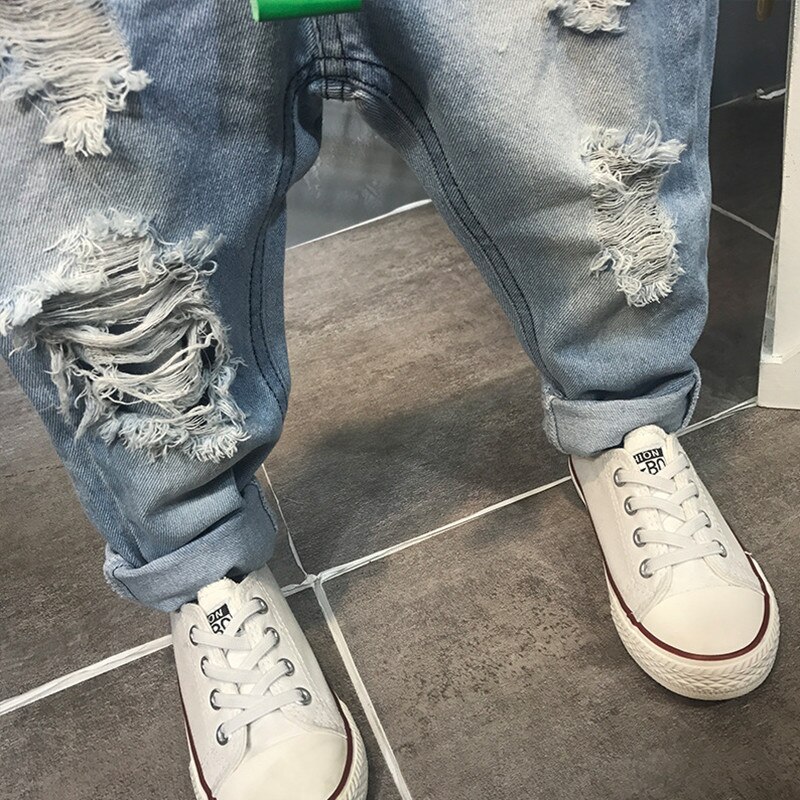 DFXD Jeans per ragazzi autunno moda cotone elastico in vita Jeans strappati pantaloni pantaloni lunghi in Denim con foro rotto pantaloni senza cintura 2-7 anni