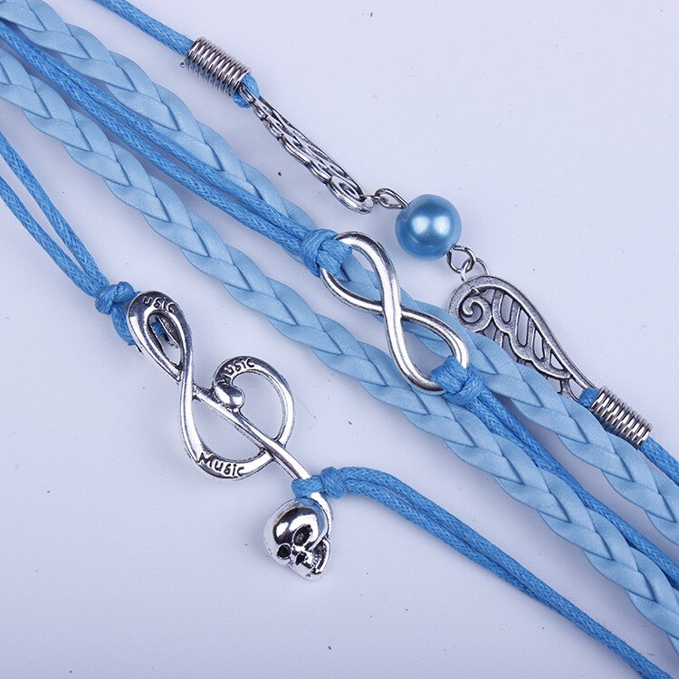 Schedel muziek symbool vleugels 8 woorden oneindig diy handgemaakte wax touw vrouwelijke armband