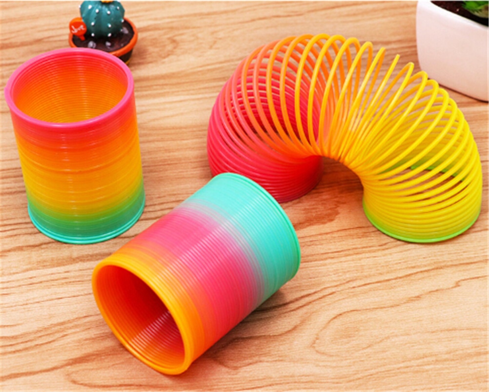 1pz Arcobaleno Cerchio Divertente Giocattoli in Anticipo di Sviluppo Educativi Pieghevole Molla Elicoidale di Plastica Creativi per Bambini Giocattoli Magici