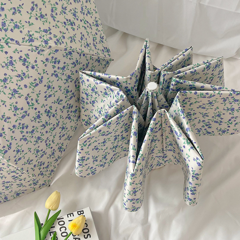 1-delige kleine blauwe bloemenparaplu, zachte stijl, zonbescherming, drievoudige automatische paraplu voor alle weersomstandigheden