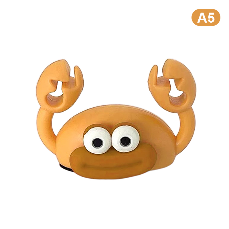 Kabelhouder met cartoonkrab, kabeloproller voor op het bureau, kabelorganizer, zelfklevende kabelhouder, kabelklem voor datakabelbeheer: Zwart