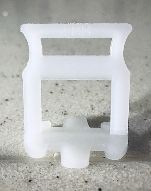 Standart Ceramic Tile Spacer Leveling System. Leveling Spacer Clips and Reusable Wedges For Large Format floor.