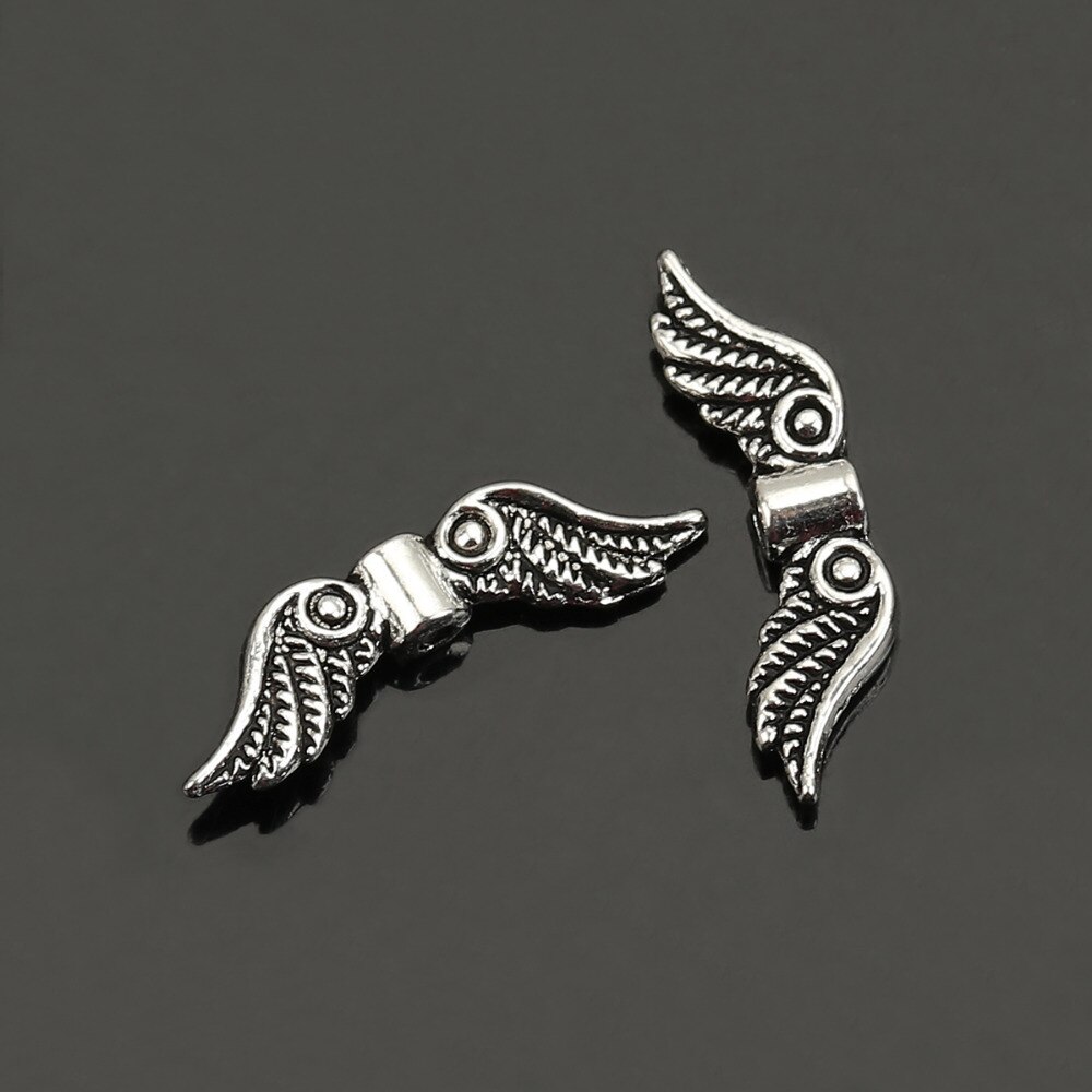 DoreenBeads Retail 50 Silver Color Angel Wing Charm Spacers Beads 23x7mm