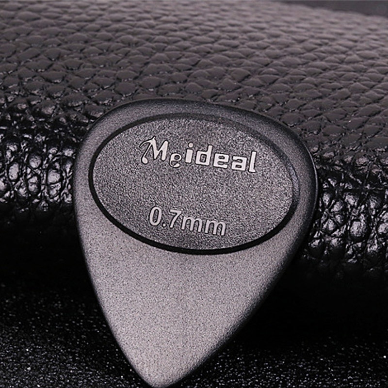 10 Uds púas de Guitarra antideslizantes, púas negras de 0,7mm de espesor, accesorios duraderos para Guitarra eléctrica, bajo, Guitarra eléctrica, ukelele