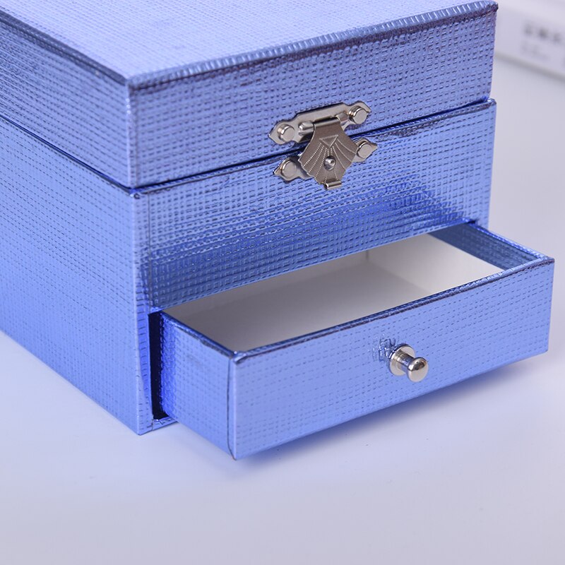 Boîte à musique en papier bleue, boîte à bijoux faite à la main carrée, boîte d'emballage, produit, proposition créative, d'anniversaire ou de noël