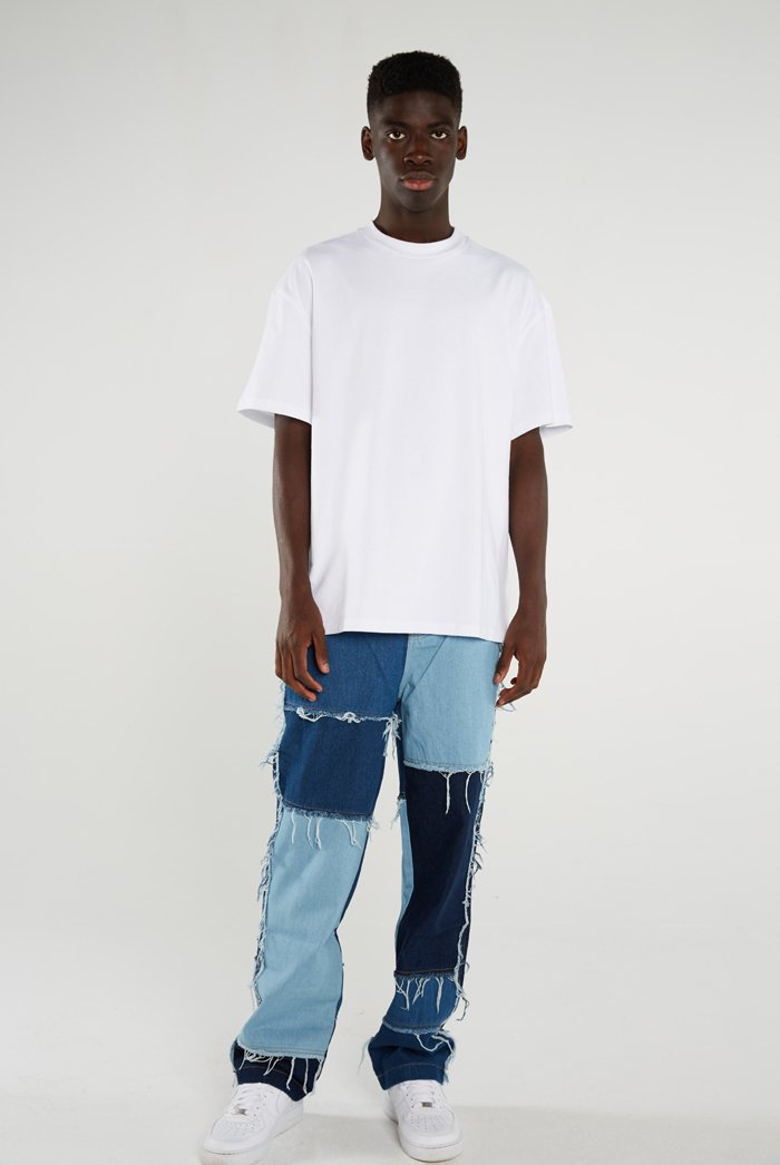 Pantalones vaqueros de pierna recta para hombre, estilo otoño y primavera, deshilachados, con retazos de colores, corte holgado,