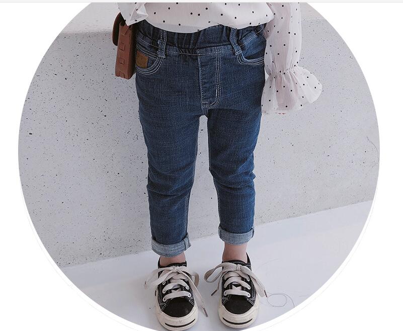 De lente meisje dragen smiley gezicht kenmerken Koreaanse jeans voor kinderen