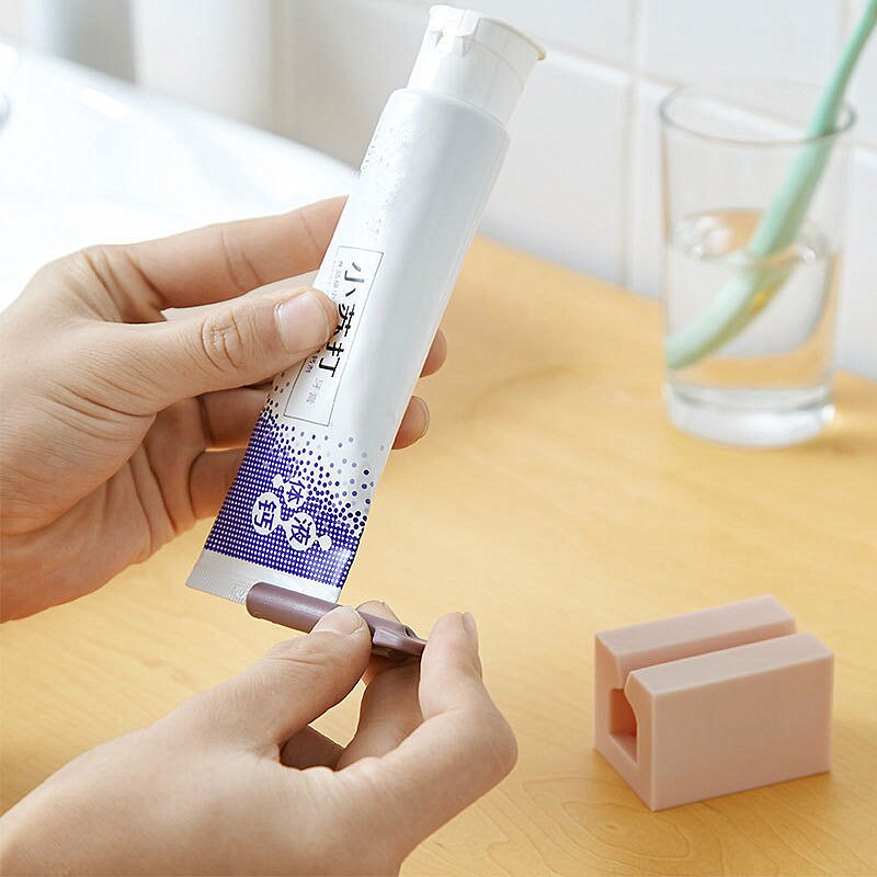 Toothpaste Squeezer Plastic Rolling Toothpaste Squeezer Tube Holder Rack Cosmetic Press Dispenser Facial Cleanser Squeezing Tube