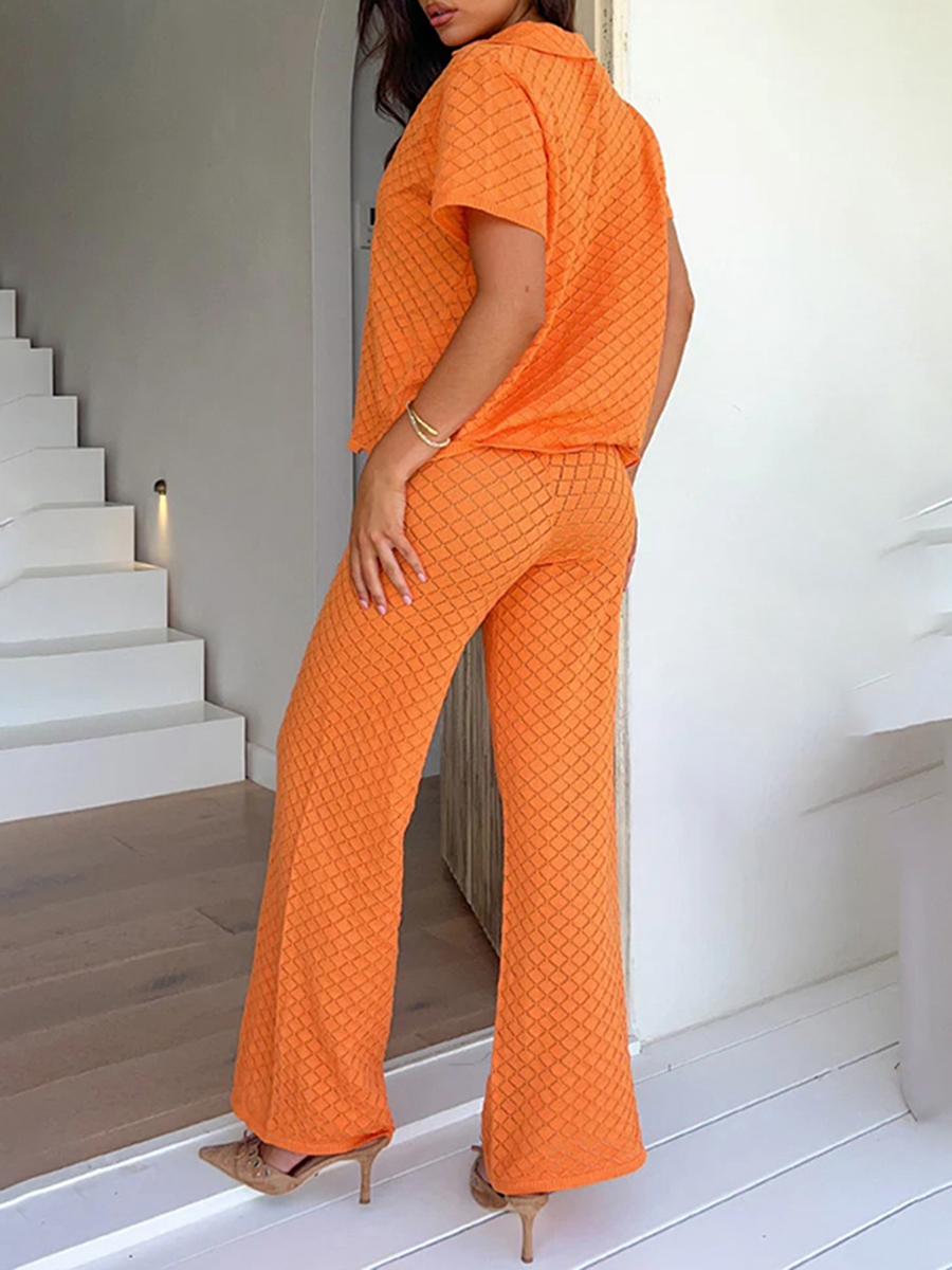 Dame s 2- delt striksæt med reversudskæring, korte ærmer, toppe med knapper + elastisk talje, vide ben, ensfarvet, outfits orange