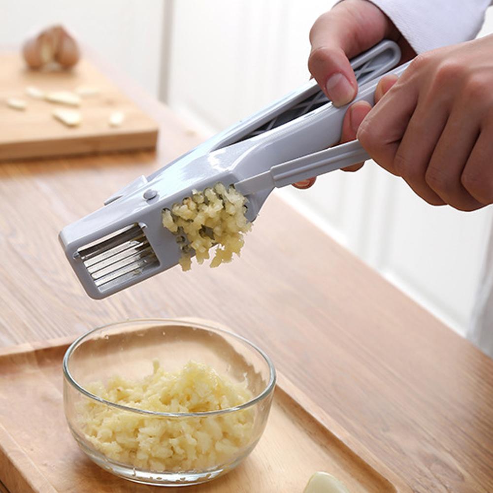 Moderne værktøj plast hvidløg knuser bærbar multifunktionel hvidløg knusing til køkken brug hvidløg ristere