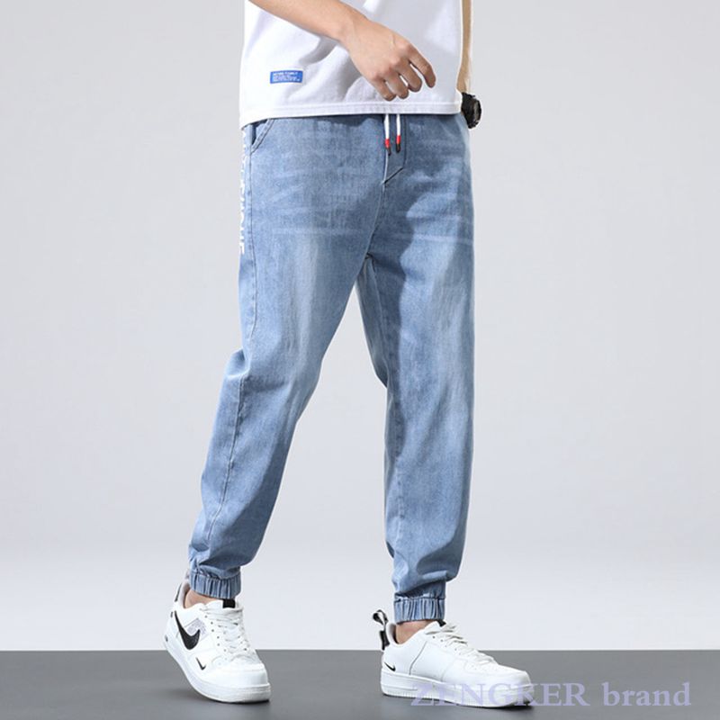 Forår 6xl jeans mænds elastiske lukkebukser løse mænds bukser plus størrelse jeans herrebukser 7xl: 6xl