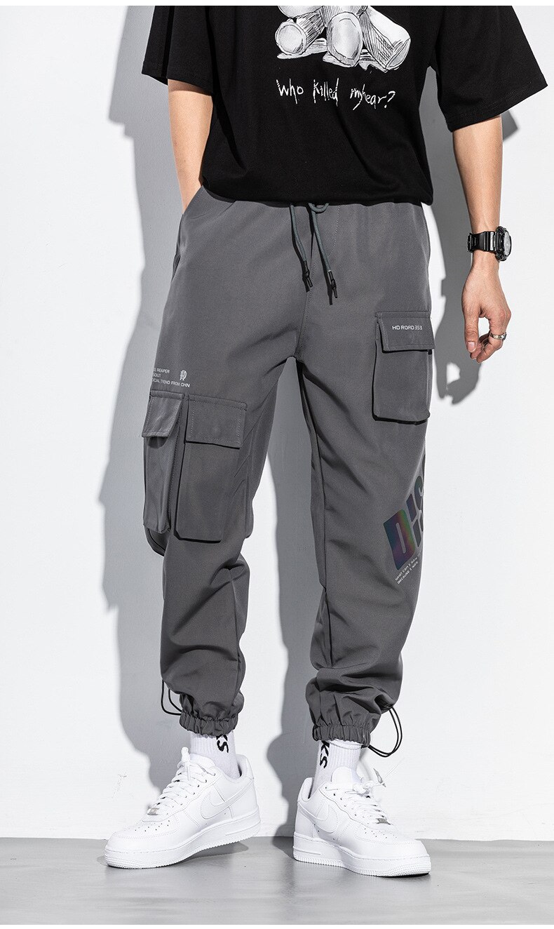 Techwear riflettente uomo Streetwear pantaloni Hip-Hop coreani Harem pantaloni Cargo Casual da uomo pantaloni larghi funzionali multi-tasca: XXXL(78-85KG) / GRAY