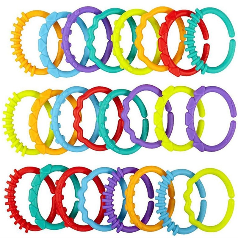24 stks baby bijtring speelgoed rammelaar kleurrijke rainbow ringen crib bed wandelwagen opknoping decoratie toys cadeau voor kinderen baby