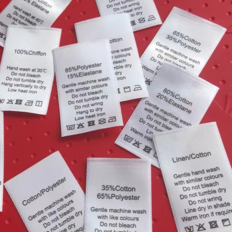 100 st vita tvättrådsetiketter för bomull/siden/kashmere/ull/linne/polyester/elastan med tryck av satintyg