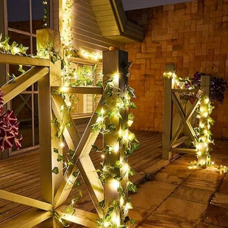 Guirnalda de luces solares de vid 50/100LED con 8 modos, hoja de hiedra Artificial, luz de hadas Solar para exteriores, decoración navideña para jardín al aire libre