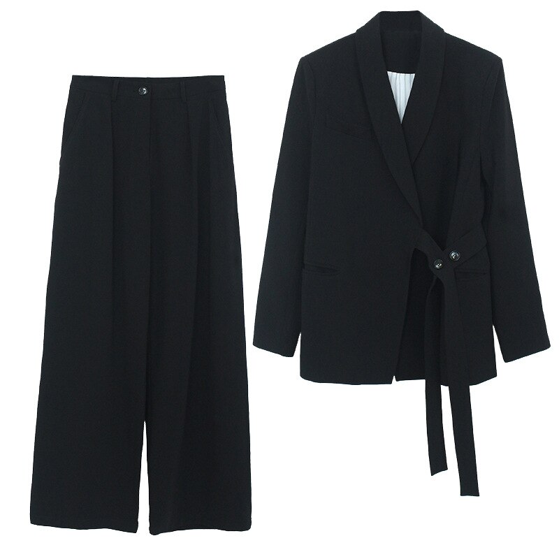Krijtstreep Maatpak Dames - Bespoke Tailoring Gids: Maatpakken, Trouwpakken, Stoffen, Kleermakers- & Onderhoudstips - De Oost Bespoke Tailoring