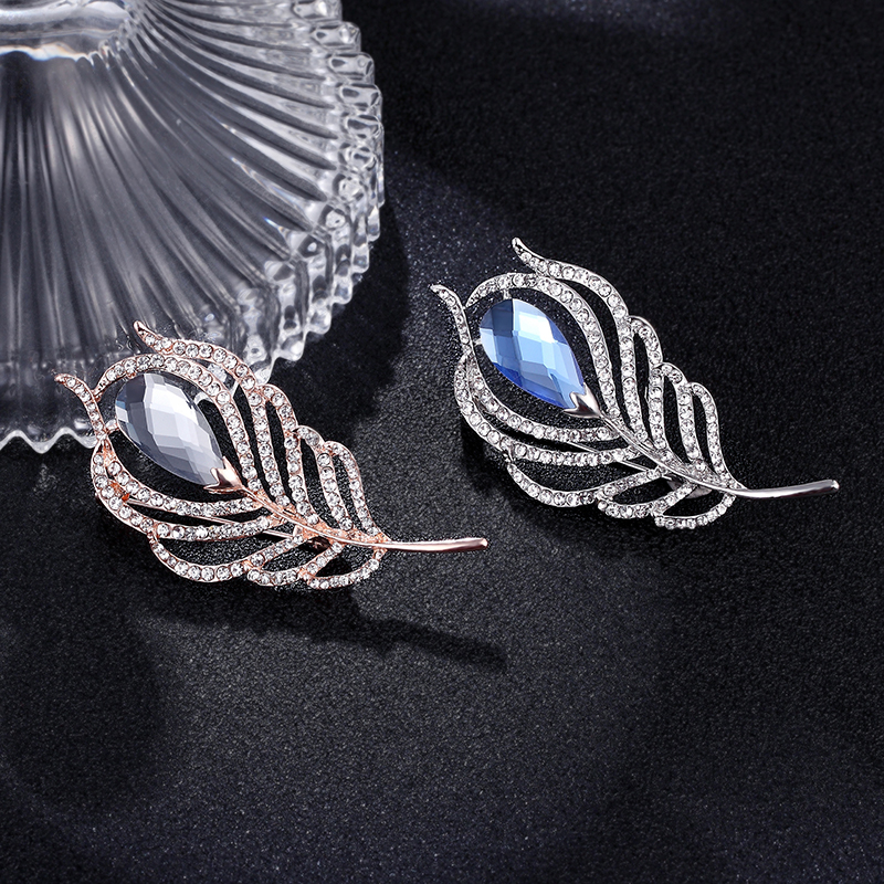 Offre spéciale femme mâle cristal plumes décontracté broche pour unisexe fête mariage strass broche manteau accessoires