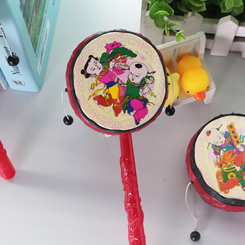Rode Chinese Traditionele Spin Speelgoed Rammelaar Drum Kids Cartoon Hand Bell Plastic Voor Baby