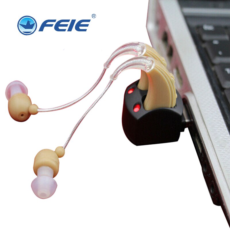 Audífonos recargables auriculares para sordos cargando en ordenador S-109S
