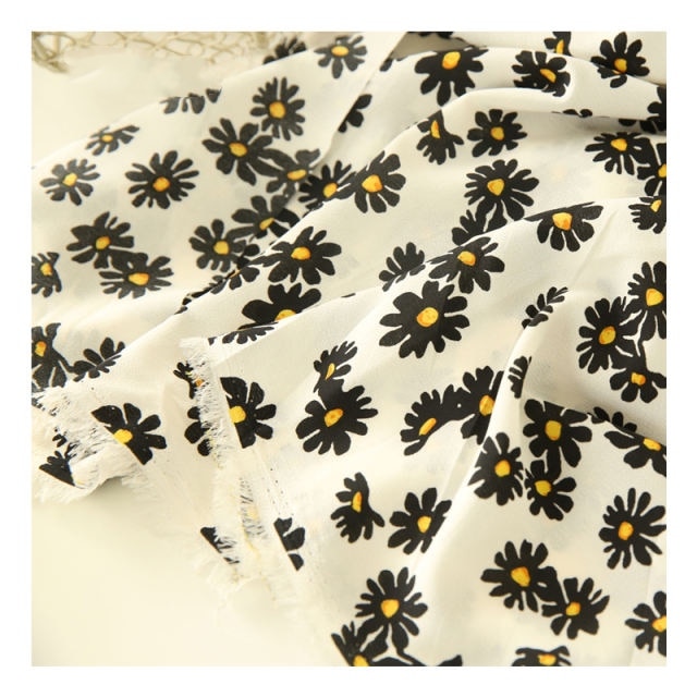 Kesämekko materiaali päivänkakkara kukka sideharso mekkokangas aurinkovoidepaita