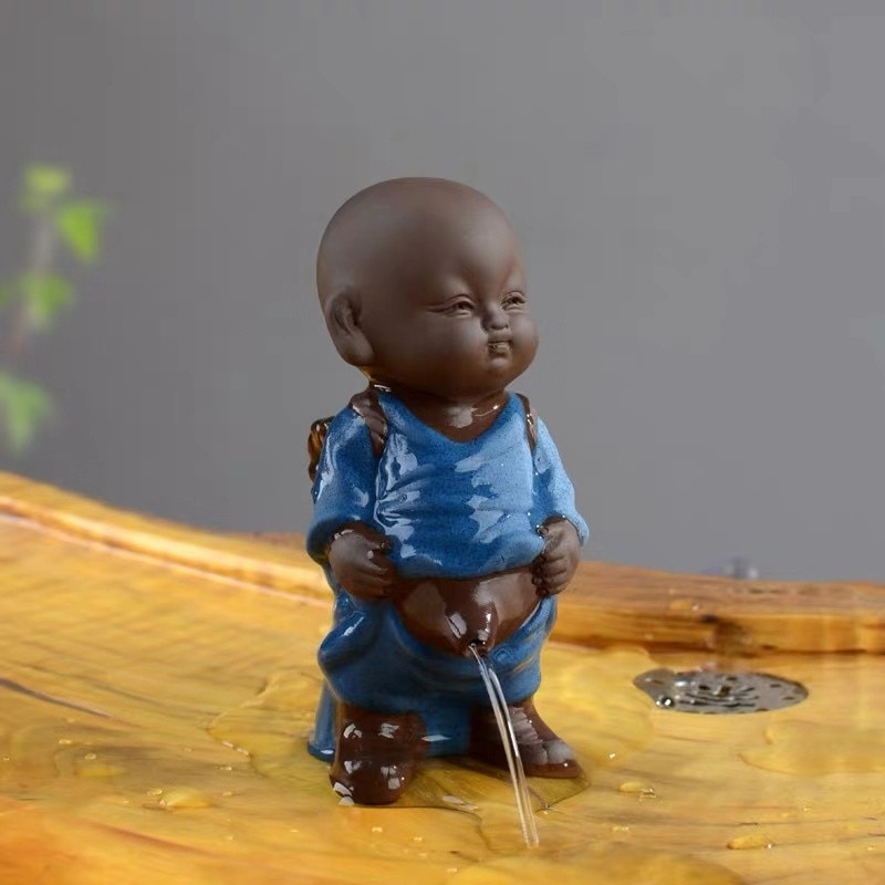 Lila lera te husdjur prydnad buddha figurer liten munk yixing pojke spray kissa tebord heminredning hantverk