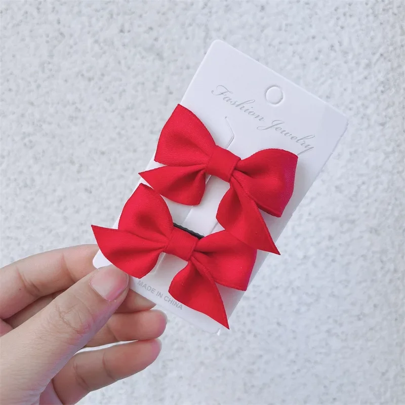 Forår/sommer børns søde sløjfe hårkort kuglehoved sød pige knækket hår sideklemme tilbehør 2 stk.: Lilla