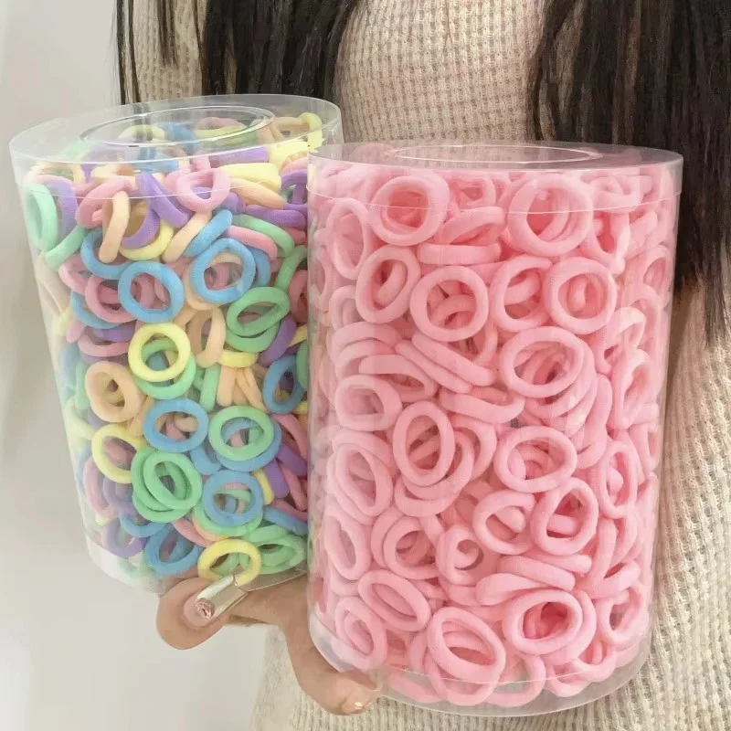 50/100/300 Uds Mini bandas elásticas coloridas para el cabello para niñas accesorios para el cabello diadema de nailon soporte para cola de caballo para niños adorno Scrunchie