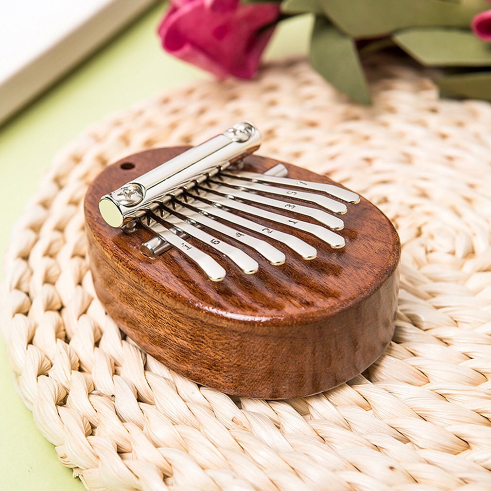 8 clave Mini Piano de pulgar Kalimba de madera de exquisito dedo pulgar Piano Marimba accesorio para instrumentos musicales de Año