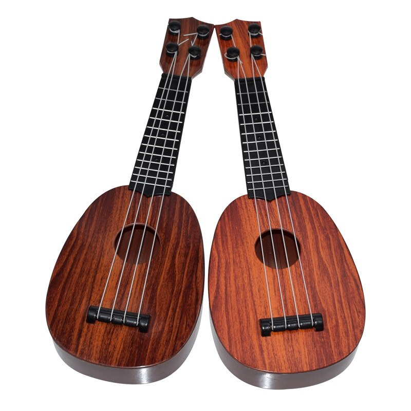 Nuovo Principiante bambini chitarra Ukulele Strumento Musicale Giocattolo Educativo Per I Bambini giocattoli interessanti Regalo Regalo Per Bambini