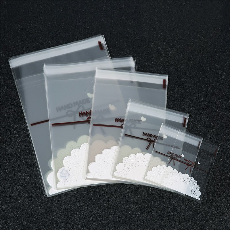 100pcs Clear Self Seal Adhesive Poly Bags 7x7 10x10 12x16 15x18 16x20cm Transparent Lace Bow Plastic Opp Jewelry Package Bag