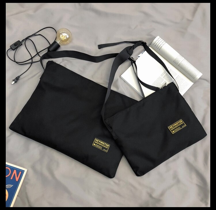 Original Aizatly Messenger bag couple Japanese casual large-capacity shoulder bag ins hip-hop simple satchel: Black / L54x3x40cm